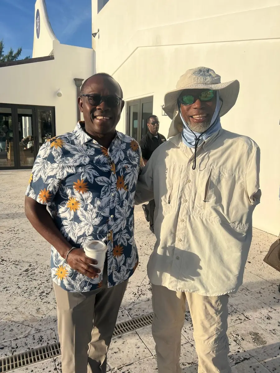 Marvin Adderley with a guest after a Great Exuma fishing trip